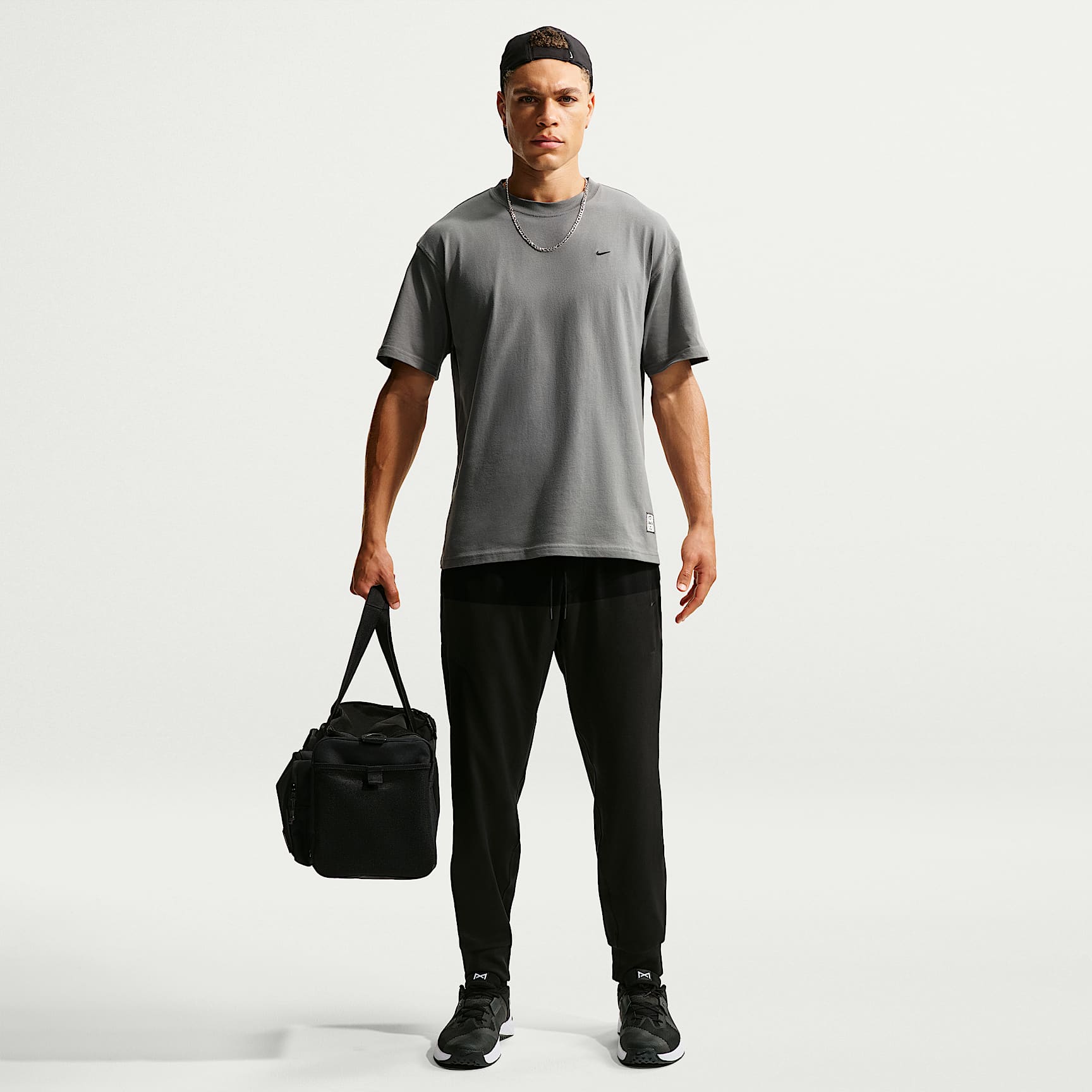 Nike Primary NanoKnit Dri-FIT UV Korumalı Erkek Performans Jogger